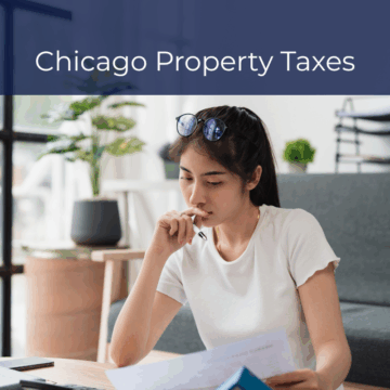 woman studying documents with laptop